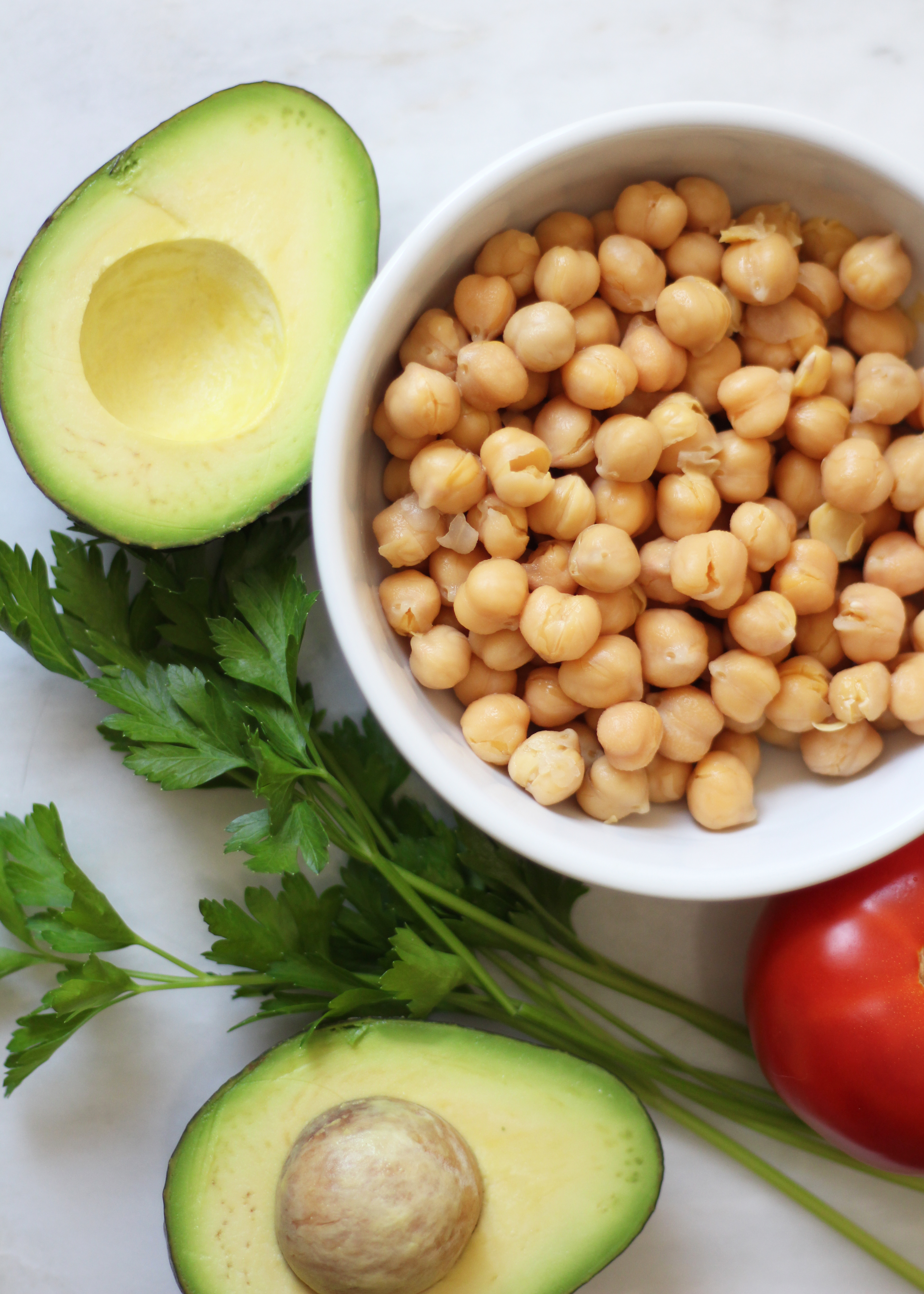 Mediterranean Chickpea Guacamole - a fun twist on the classic with the addition of chickpeas! A tasty snack, and not to mention cheaper ingredients!