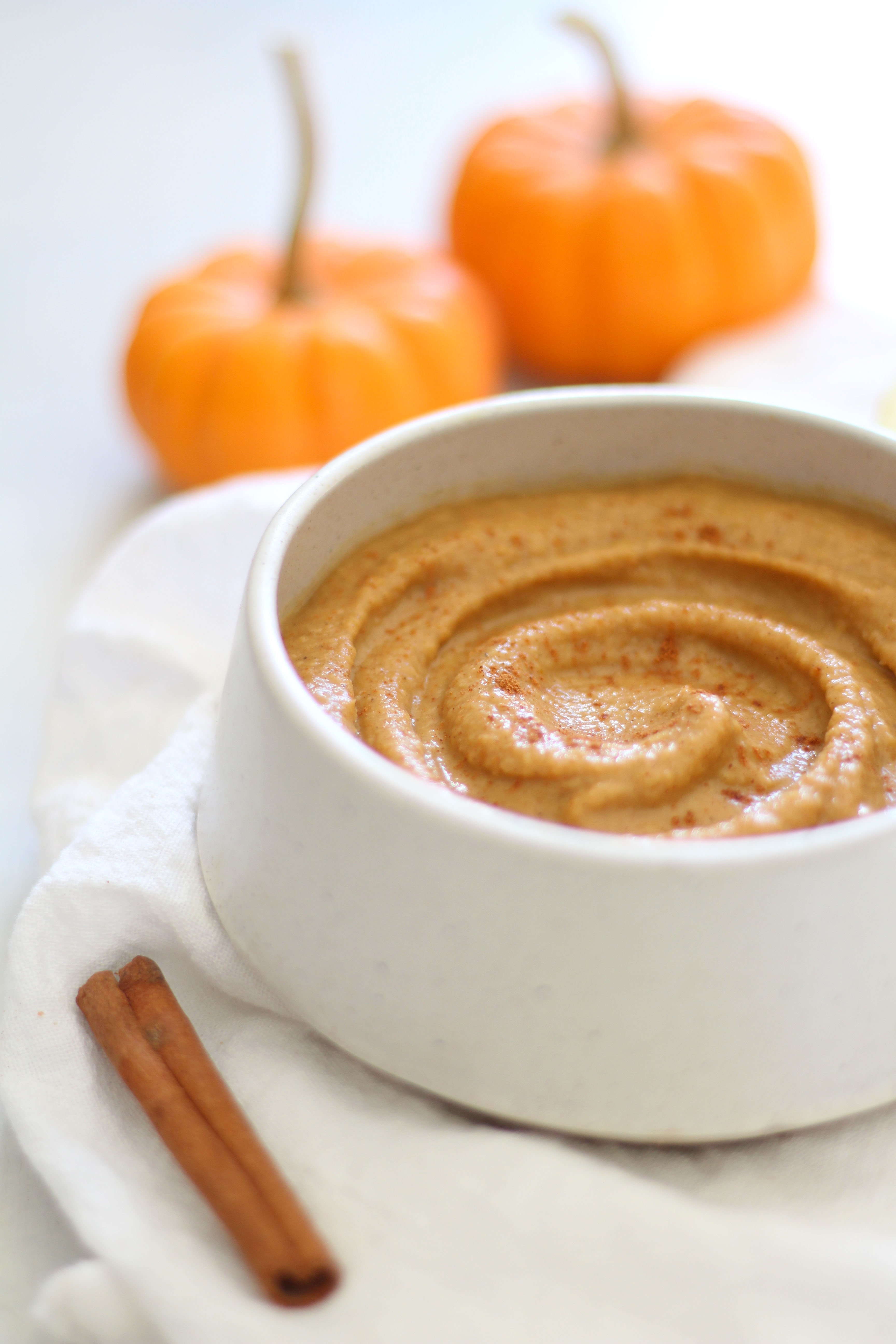 Pumpkin Pie Dessert Hummus - a healthy and sweet fall dip that's great on apples, graham crackers, and cinnamon sugar pita chips!