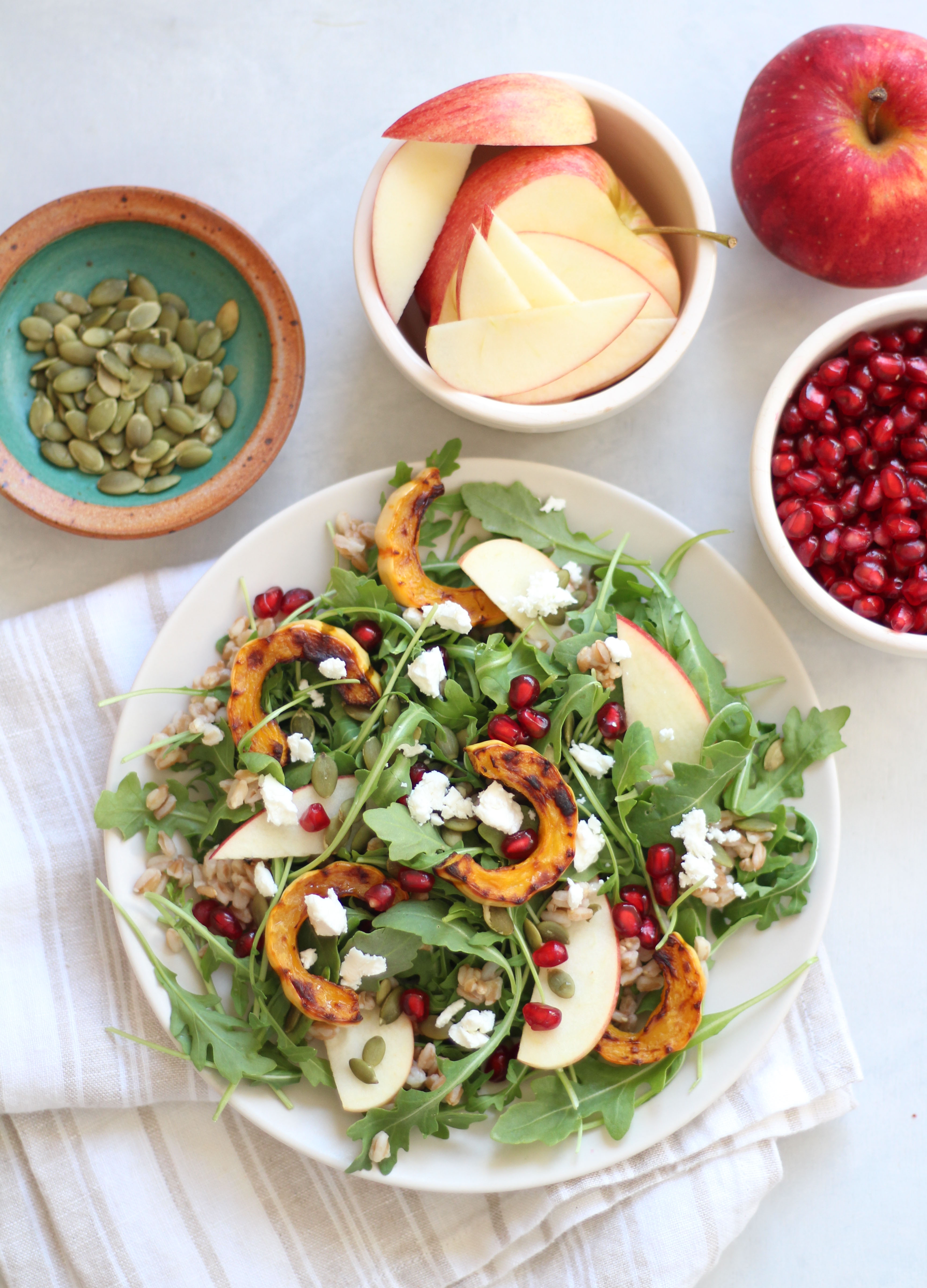 Roasted delicata squash, farro, and arugula salad - the perfect fall and winter salad! 