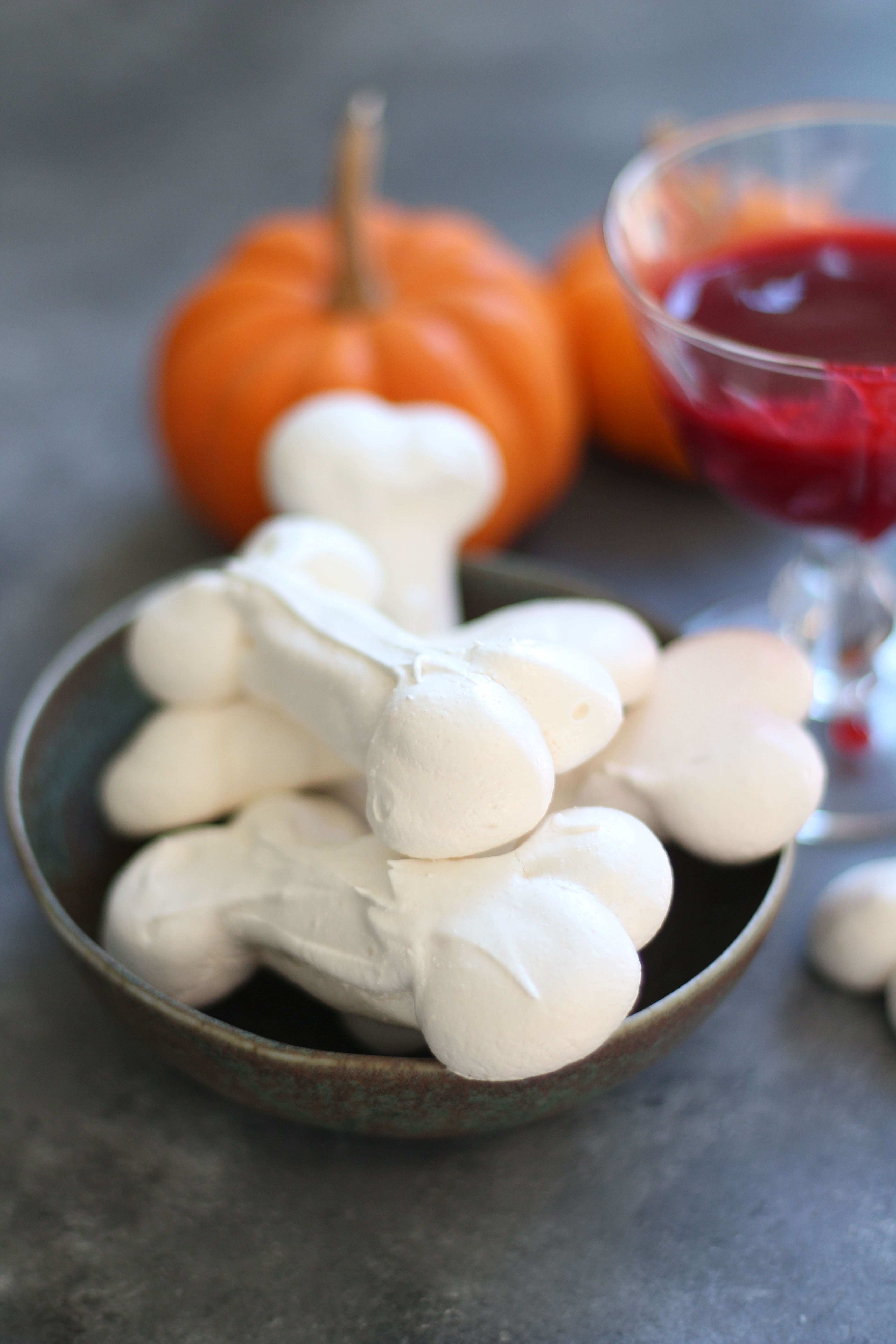 Meringue bones and raspberry "blood" - a bone-chilling treat for your Halloween bash! Perfect for kids and adults!