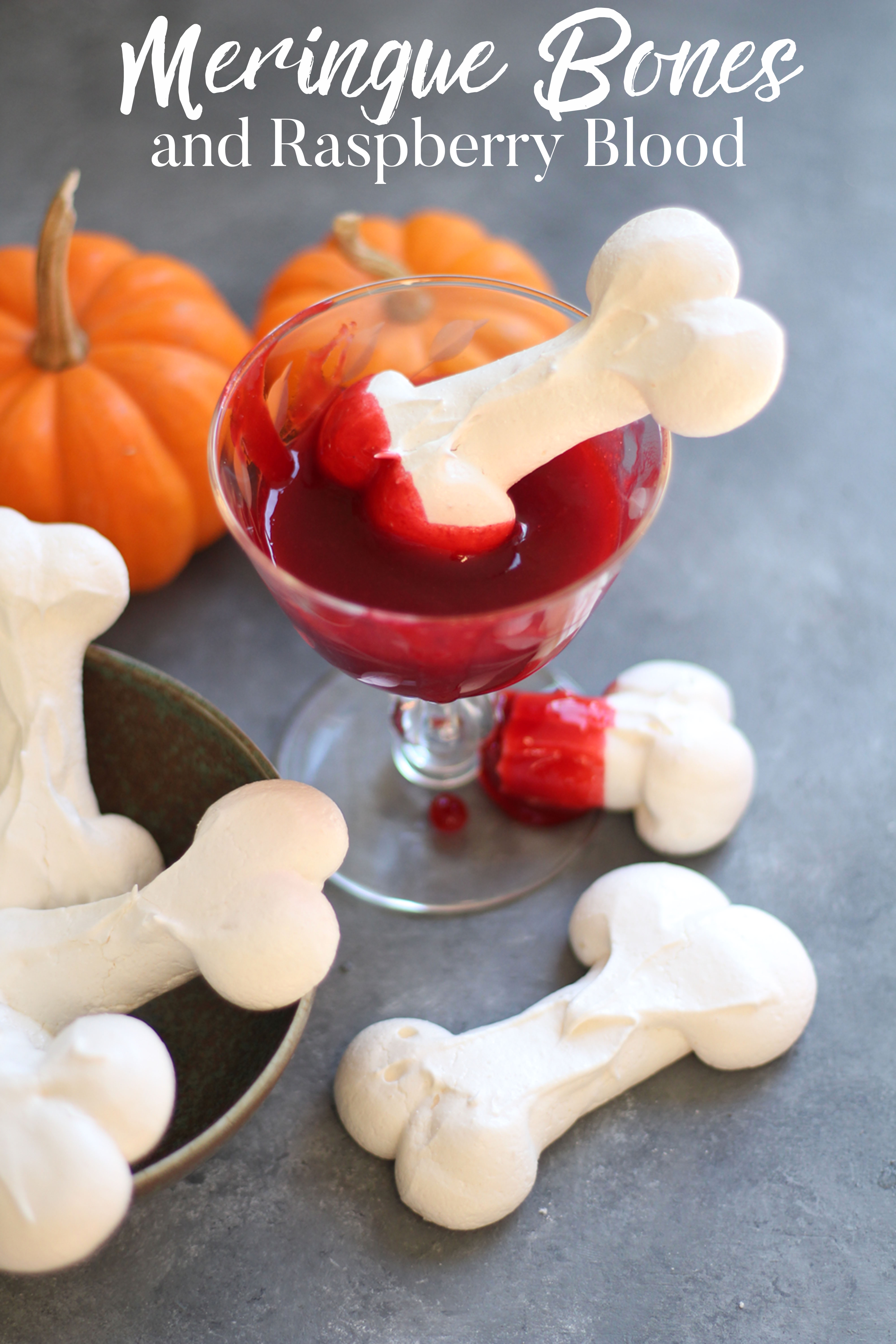 Meringue bones and raspberry "blood" - a bone-chilling treat for your Halloween bash! Perfect for kids and adults!