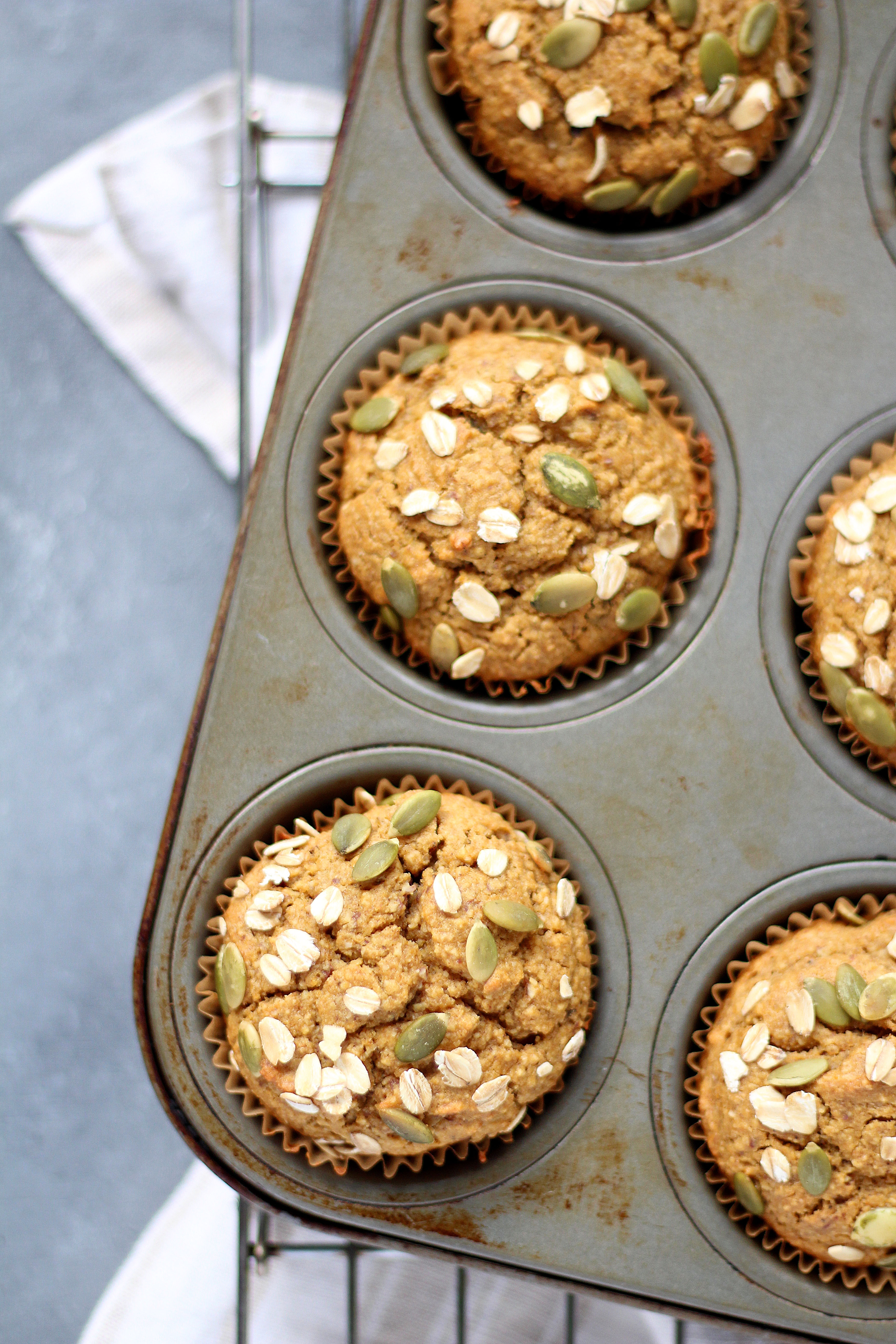 Healthy Flourless Pumpkin Muffins - a hearty and light muffin that's perfect with your morning cup of coffee!