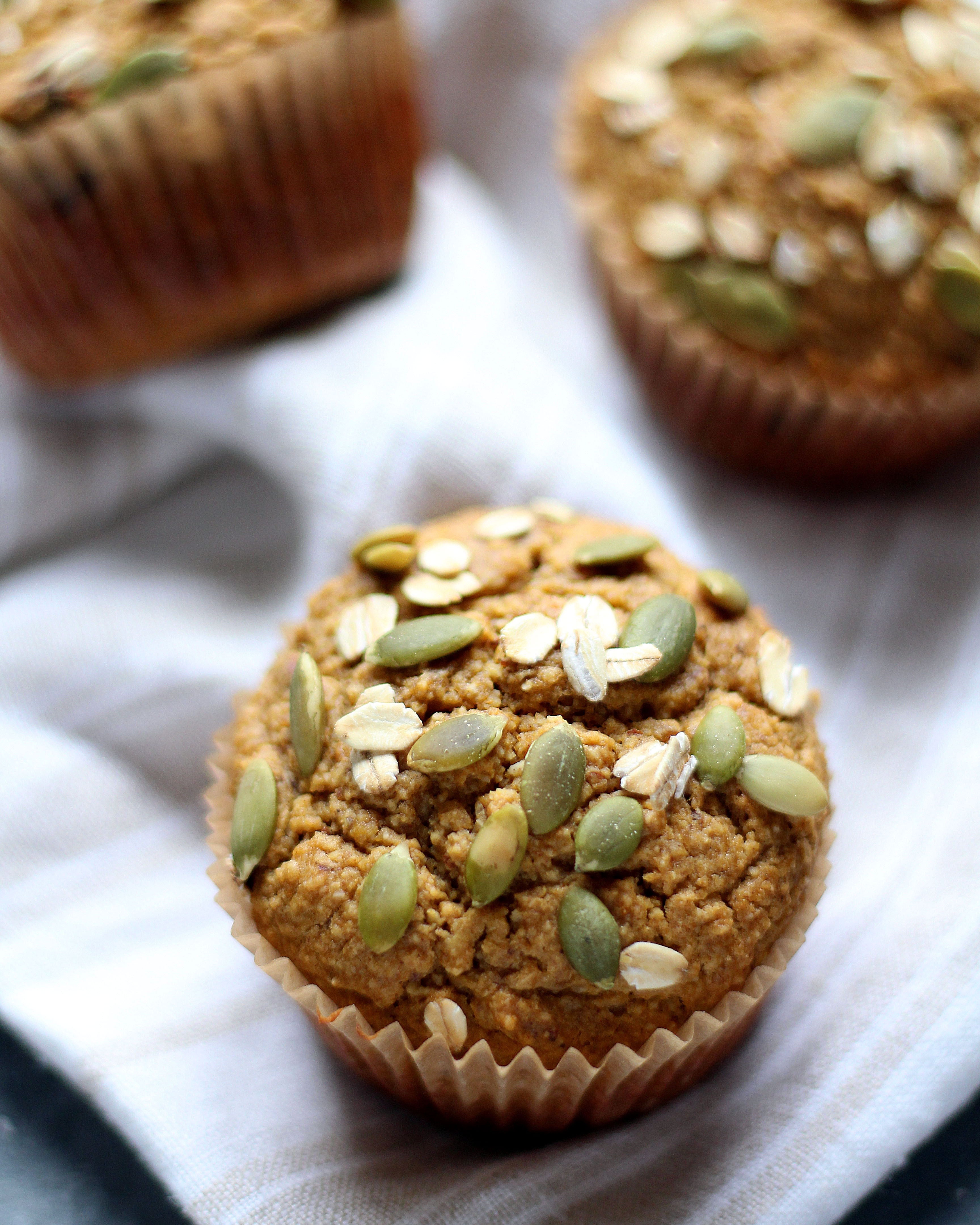 Healthy Flourless Pumpkin Muffins - a hearty and light muffin that's perfect with your morning cup of coffee!