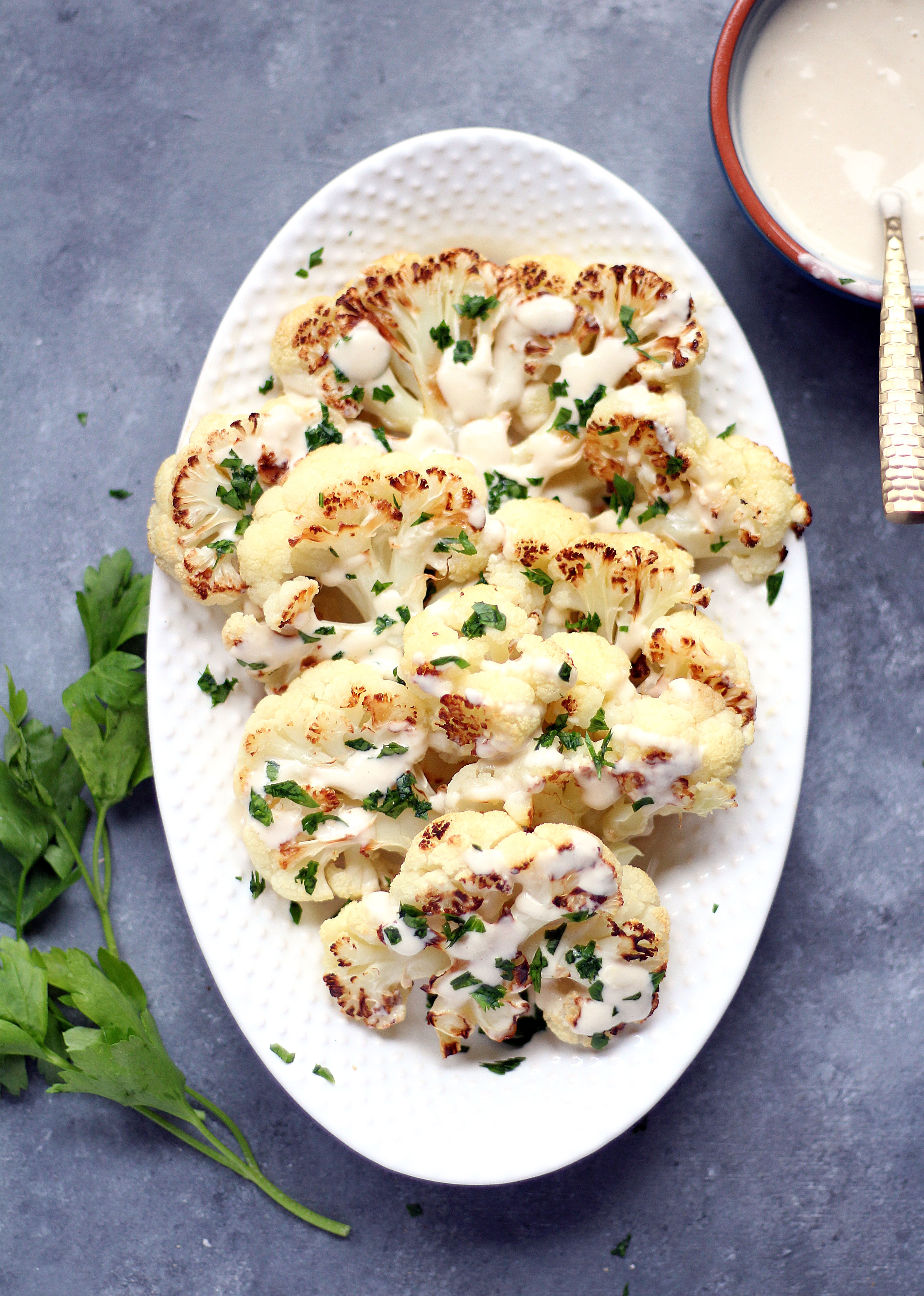 Roasted Caulliflower with a Lemon Garlic Tahini Sauce