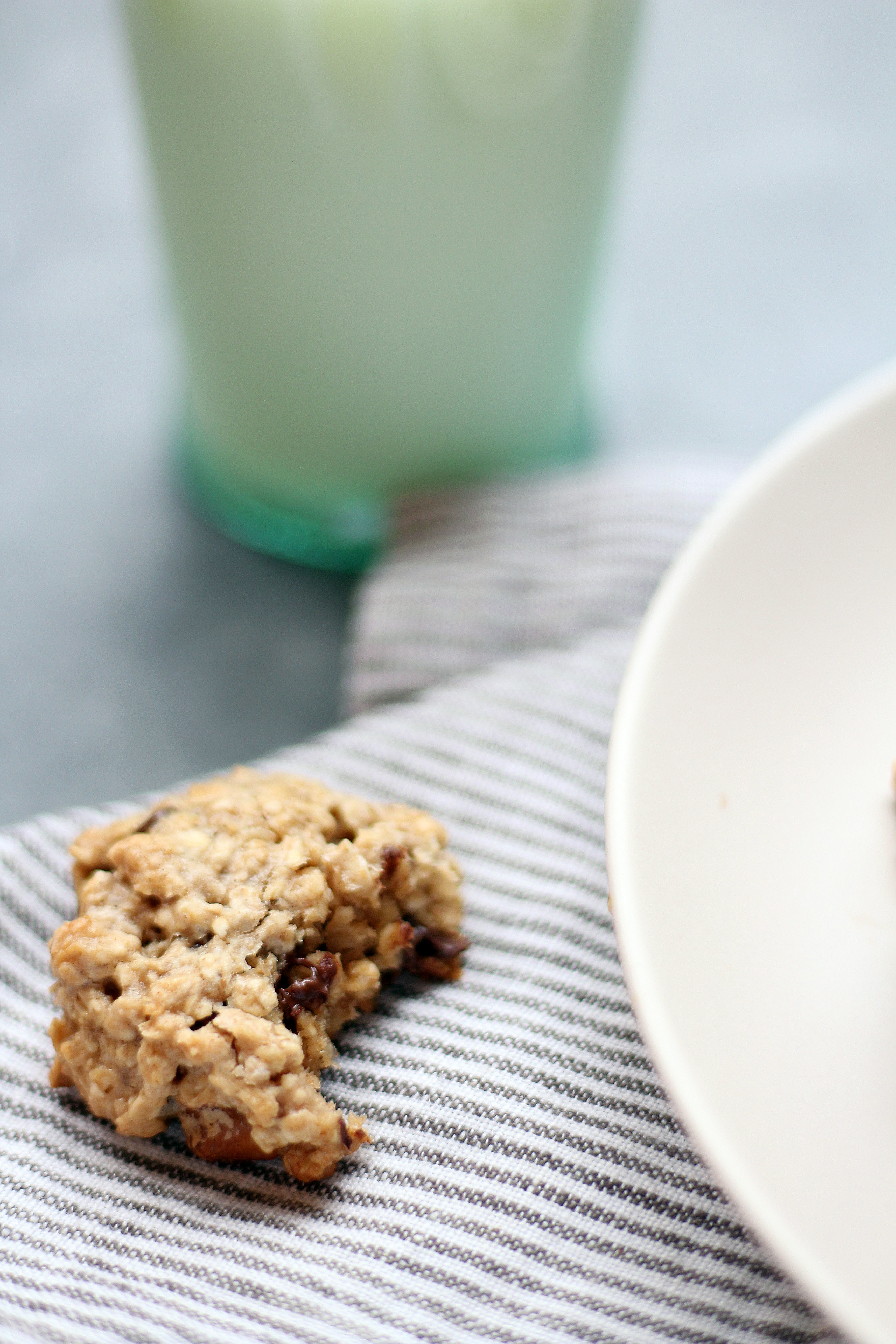 Quick Tahini Oat Cookies. Sweetened with pure maple syrup and balanced out with dark chocolate and crunchy nuts. 