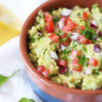 Mediterranean Chickpea Guacamole - a fun twist on the classic with the addition of chickpeas! A tasty snack, and not to mention cheaper ingredients!