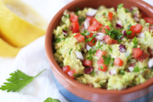 Mediterranean Chickpea Guacamole - a fun twist on the classic with the addition of chickpeas! A tasty snack, and not to mention cheaper ingredients!